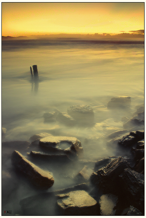 last... | ocean, mist, shore, rocks, dawn