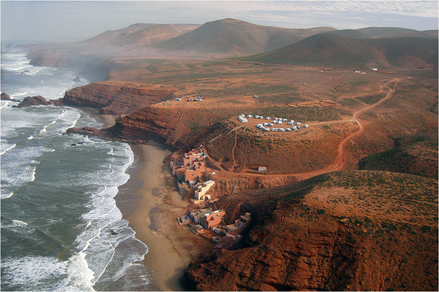 coast of ocean | city, waves, beach, sand, mountains, ocean, panorama