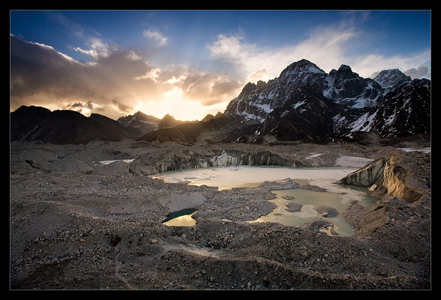 Ngozumpa glacier (no.1) | sun, water, rocks, glacier, mountains