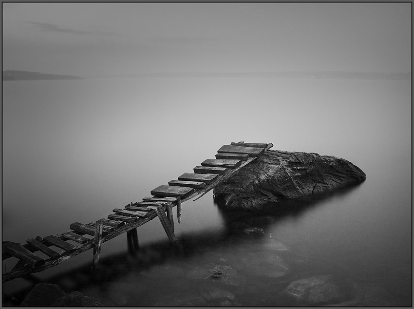 about the sturdy wooden bridge | rock, black and white, river, bridge