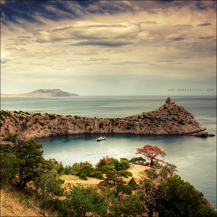 New World | rock, bay, yacht, sky, clouds, sea