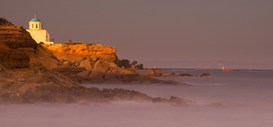 One of the sunsets | house, haze, sea, rocks