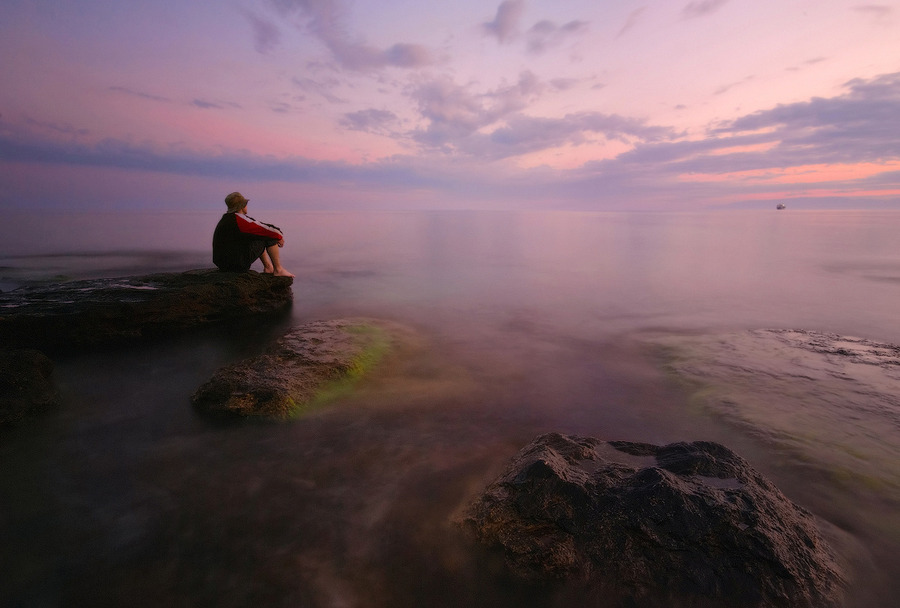 Remembering the Sea | evening, haze, rocks, people, sea