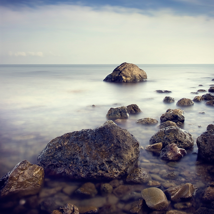 Talking with the stones | foam, sea, rocks