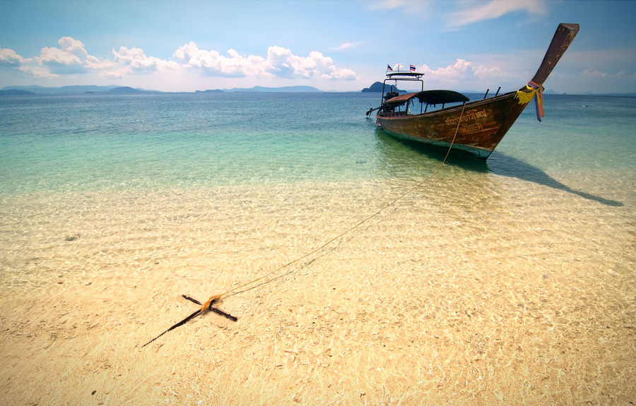 An island | sand, sea, boat