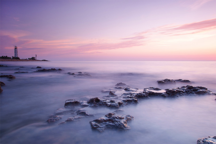 Sunset at the lighthouse | foam, sea
