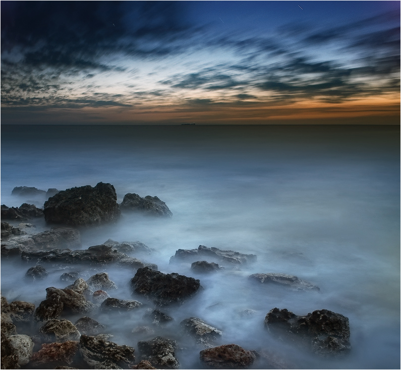 Movement of the sky and the sea | sea, foam, rocks