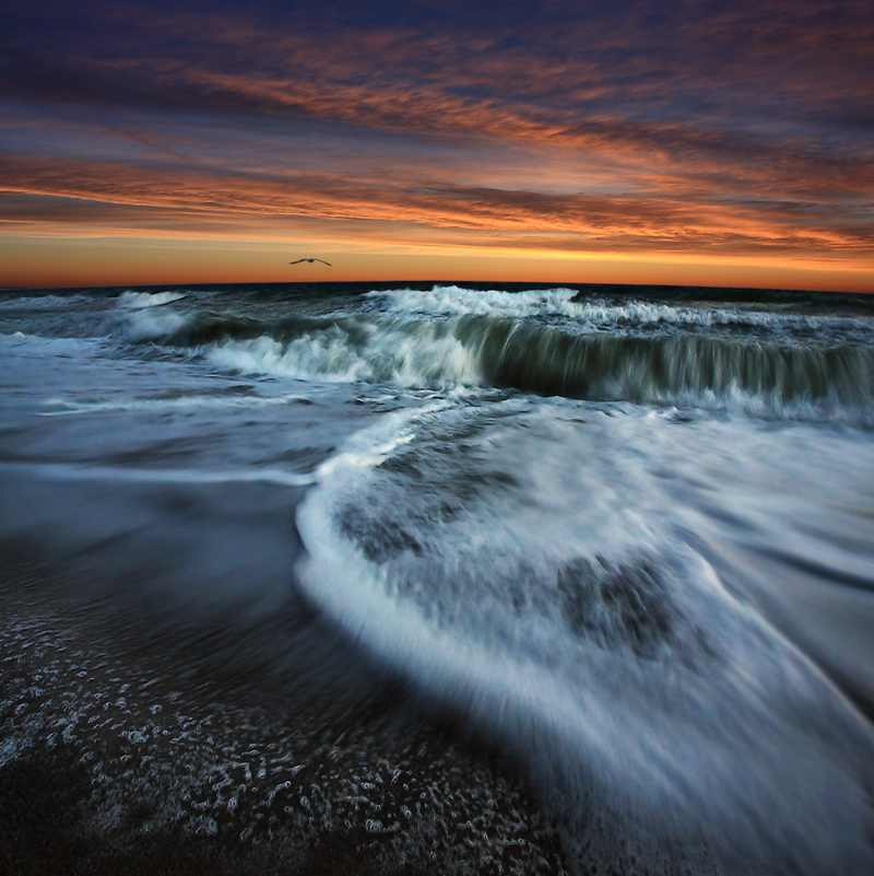 View from the restaurant by the shore | surf, sea, dusk