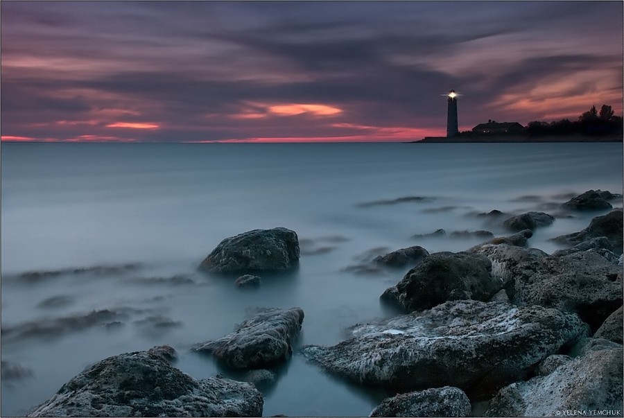 Onshore lighthouse  | shore, evening, water, skyline, dusk, sunset, rocks, stones, sea, sky, lighthouse