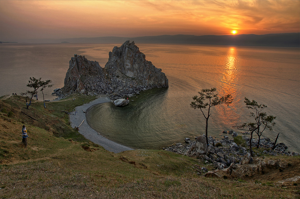 I stand alone | dusk, river, cliff, sun