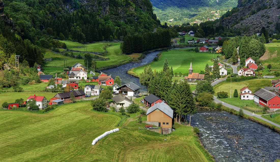 Village at the foot of the mountain | mountain, village, lawn, hillside